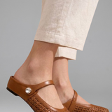 Mules plates femme en tressé à bride