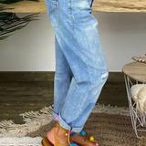Jean bleu déchiré taille mi-haute pour femme