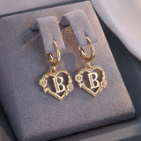 Boucles d'oreilles créoles cœur avec initiale, femme
