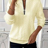 Pull femme torsadé à col zippé