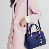 Sac à main femme nœud et breloque étoile
