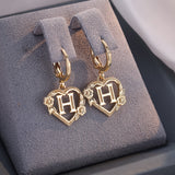 Boucles d'oreilles créoles cœur avec initiale, femme