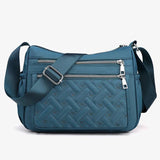 Sac bandoulière femme déperlant à plusieurs compartiments