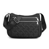 Sac bandoulière femme déperlant à plusieurs compartiments