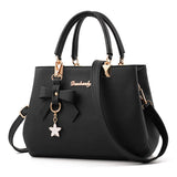 Sac à main femme nœud et breloque étoile