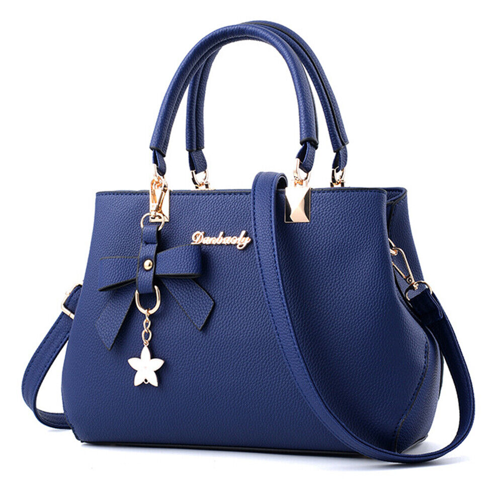 Sac à main femme nœud et breloque étoile