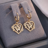 Boucles d'oreilles créoles cœur avec initiale, femme