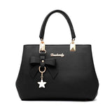 Sac à main femme nœud et breloque étoile