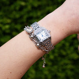Montre femme carrée à chiffres romains, bracelet acier