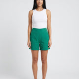 Short femme taille haute jambe droite à poches