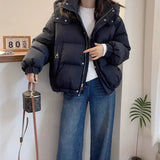 Doudoune à capuche et col montant pour femme