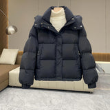 Doudoune à capuche et col montant pour femme