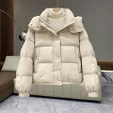 Doudoune à capuche et col montant pour femme