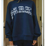 Sweat oversize femme col montant imprimé varsity