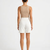 Short femme taille haute jambe droite à poches
