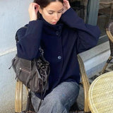 Veste femme en laine boutonnée à col montant