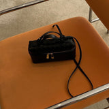 Sac à main tressé compact en cuir vegan