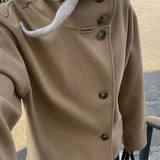 Veste femme en laine boutonnée à col montant