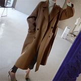 Manteau long en laine croisé à ceinture pour femme
