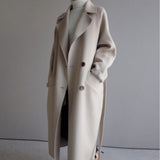Manteau long en laine croisé à ceinture pour femme